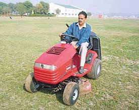 A Toro mower being operated in the new polo ground which has come up in Patiala