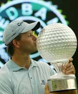 South Africa�s Retief Goosen kisses the Nedbank Golf Challenge Trophy at Sun City, South Africa