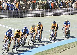 Cyclists from East and West Punjab in action during the mass start 6km race final at the Punjabi University stadium in Patiala on Monday