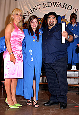 Former Argentine soccer star Diego Maradona and his ex-wife Claudia 3pose with their daughter Dalma during Dalma's high school graduation in Buenos Aires on Monday