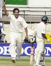 Indian bowler Irfan Pathan celebrates the dismissal of Rajin Saleh of Bangladesh during the first cricket Test in Dhaka on Friday.