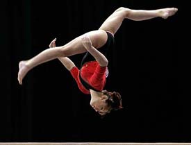 Nan Zhang of China competes on the beam