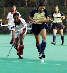 The inaugural match between Northern Railway and S.E. Railway in progress