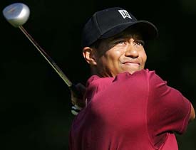 Tiger Woods tees off on the fifth hole during the final round of the sixth annual Target World Challenge golf tournament at Sherwood Country Club in Thousand Oaks, California, on Sunday. 