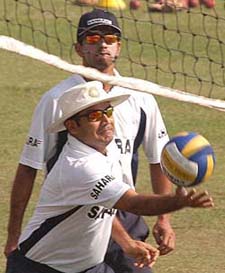 Rahul Dravid and Virender Sehwag playing volleyball during a practice session in Chittagong