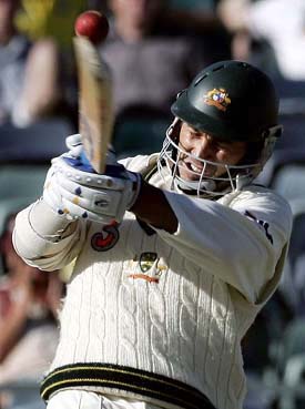 Australia's Justin Langer plays a hook shot