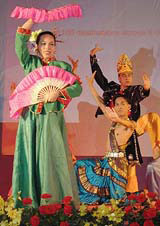 Malaysian folk dancers perform their traditional dance during the inaugural function of the Kuala Lumpur-Ahmedabad flight in Ahmedabad on Friday evening. 