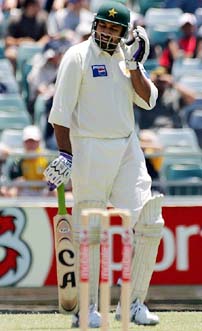 Pakistan captain Inzamam-ul-Haq walks off the ground after being dismissed first ball by Australia�s Glenn McGrath on the fourth day of the first Test in Perth on Sunday.