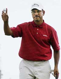 Jeev Milkha Singh holds the ball during the third round of the Asia-Japan Okinawa Open at the Naha Golf Club in Okinawa, southern Japan, on Saturday.