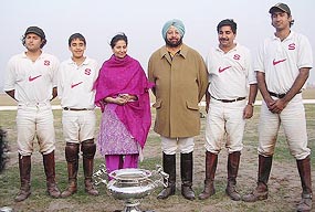 Members of the Sehgal Studs team, winners of the Patiala Polo Cup, with Punjab Chief Minister Amarinder Singh and Patiala MP Preneet Kaur at the New Polo Ground in Patiala on Sunday. 