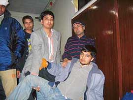 Manish of Talwara whose spinal cord and backbone have suffered major injuries during torture by Turkish Guards. Vasudev, who has bleeding blisters on his feet.