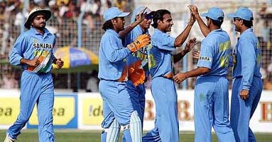 Indian players celebrate the dismissal of Bangladeshi batsman Mohammad Ashraful during the first one-day international in Chittagong