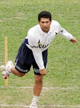 Sachin Tendulkar bowls during a practice session in Dhaka on Saturday