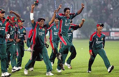 Bangladesh cricket players celebrate after defeating India by 15 runs in the second one-day international in Dhaka
