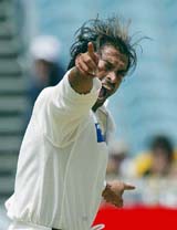 Pakistan�s Shoaib Akhtar celebrates after dismissing Australia�s Shane Warne