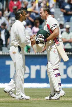 Pakistan�s Shoaib Akhtar congratulates Australia�s Matthew Hayden after the hosts won the second Test in Melbourne on Wednesday