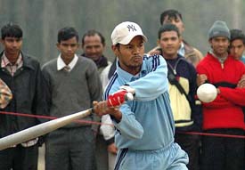 A Chandigarh player gets ready to hit the ball in a match against Andhra Pradesh during the Senior National Softball Championship in Chandigarh on Thursday