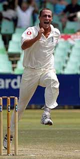 England bowler Simon Jones celebrates the dismissal of South African batsman Hashim Amla on day five of the second Test in Durban