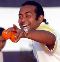 Leander Paes smiles during a practice session in Chennai on Sunday