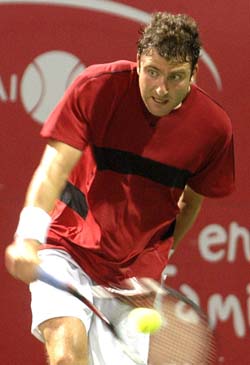 Justin Gimelstob of USA returns to fourth seed Tomas Bjorkman of Sweden