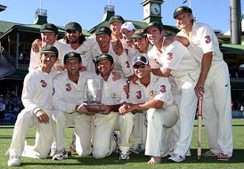 The Australian Test cricket team pose with the series trophy after beating Pakistan in the third Test at the Sydney Cricket Ground. Australia won the Test by nine wickets giving them a 3-0 series win over Pakistan