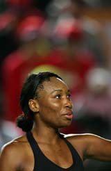 Venus Williams of the USA acknowledges the crowd after beating Vera Zvonareva of Russia in a tennis challenge in Hong Kong on Thursday