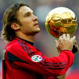 AC Milan's European Footballer of the Year Andriy Shevchenko shows the Golden Ball to supporters 