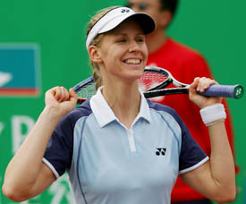 Russia's Elena Dementieva smiles after winning the match point during the final of a tennis challenge against Venus Williams of the USA in Hong Kong