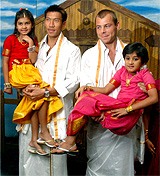 Tennis stars Pradon Srichaphan of Thailand (left) and Thomas Zib of Chzechoslovakia wear traditional South Indian outfits as they pose for a photograph in Chennai on Saturday