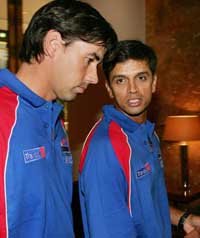 Rahul Dravid of Asian XI chats with Stephen Fleming of World XI on the eve of the tsunami fund-raiser in Melbourne