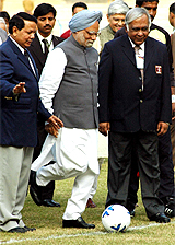 Prime Minister Manmohan Singh kicks off the 9th National Football League at Kolkata's Salt Lake stadium 