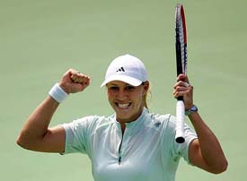 Australia�s Alicia Molik celebrates after beating compatriot Samantha Stosur in the final of the Sydney International tennis tournament on Saturday