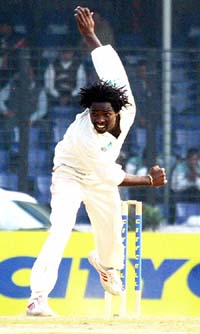 Zimbabwe pacer Douglas Hondo bowls on the second day of the second Test against Bangladesh in Dhaka on Saturday