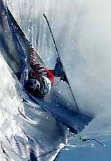 Italy's Roland Fischnaller crashes during the men's Alpine skiing World Cup downhill race in Wengen, Switzerland