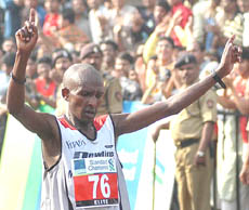 Kenya's Julius Sugut reacts after winning the 'International Marathon 2005' in Mumbai on Sunday.