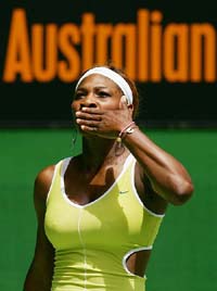 Serena Williams from the USA blows kisses to the crowd after winning her first round match against Camille Pin from France at the Australian Open in Melbourne on Monday