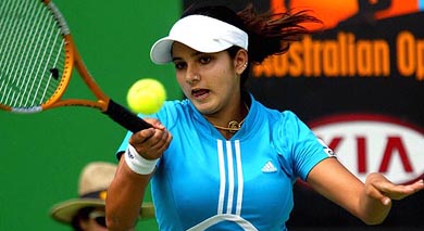 Sania Mirza of India returns a forehand during her first round match against Cindy Watson of Australia at the Australian Open on Monday