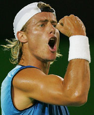 Lleyton Hewitt of Australia reacts during his first round match against France�s Arnaud Clement at the Australian Open tennis tournament in Melbourne on Tuesday