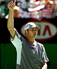 Andy Roddick of the USA reacts after winning his first round match against Georgia�s Irakli Labadze at the Australian Open tennis tournament in Melbourne on Tuesday
