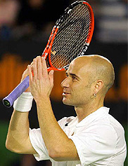 Eighth seed Andre Agassi of the USA celebrates his win over compatriot Taylor Dent