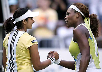 Serena Williams of the USA shakes hand with Sania Mirza after their match at the Australian Open  on Friday. Serena won 6-1, 6-4