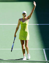 Maria Sharapova of Russia waves to the crowd after her fourth round victory over Silvia Farina Elia of Italy at the Australian Open in Melbourne on Sunday
