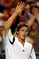 Marat Safin of Russia waves to the crowd after his fourth round victory over Olivier Rochus of Belgium at the Australian Open