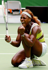 Serena Williams of the USA rejoices after beating Maria Sharapova of Russia in the semifinal at the Australian Open in Melbourne on Thursday
