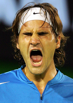 Top seed Roger Federer of Switzerland reacts after losing a point during his semifinal against fourth seed Marat Safin of Russia at the Australian Open in Melbourne on Thursday