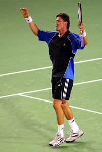 Marat Safin celebrates his victory over Roger Federer in the semifinal of the Australian Open in Melbourne on Thursday