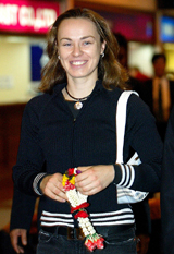 Former Swiss tennis champion Martina Hingis arrives at Bangkok airport on Thursday