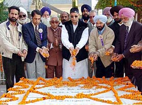 Punjab Minister of State for Science and Technical Education Rakesh Pandey pays floral tributes to Lala Lajpat Rai at Dhudike village on Friday.