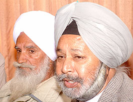 Major Rajbir Singh, who has resigned as Chairman of the Punjab Livestock Development Corporation, addresses a press conference in Amritsar on Monday.