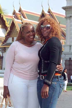 Australian Open tennis champion Serena Williams  and her mother visit Bangkok's Emerald Temple during a tour of the city